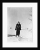 1930s woman holding ski poles skiing in snow by Anonymous