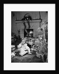 1950s smiling little girl christmas tree talking on toy telephone by Anonymous