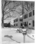 1960s woman walking to rural mailbox in front of home in snow piled with christmas packages by Anonymous