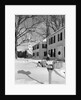 1960s woman walking to rural mailbox in front of home in snow piled with christmas packages by Anonymous