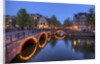 Evening light old buildings and bridge along the many Canals of Amsterdam, Netherlands by Anonymous