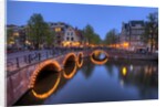 Evening light old buildings and bridge along the many Canals of Amsterdam, Netherlands by Anonymous