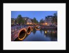Evening light old buildings and bridge along the many Canals of Amsterdam, Netherlands by Anonymous