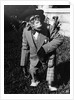 Portrait of dressed- up chimp by Anonymous