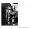 Portrait of dressed- up chimp by Anonymous