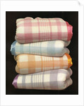 Vintage illustration of four stacked wool blankets by Anonymous