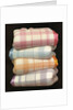 Vintage illustration of four stacked wool blankets by Anonymous
