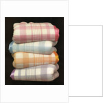 Vintage illustration of four stacked wool blankets by Anonymous