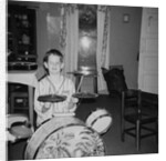 Ten year old boy on drum set, ca. 1969. by Anonymous