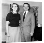 Young newlyweds smile for a portrait, ca. 1956. by Anonymous