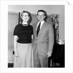 Young newlyweds smile for a portrait, ca. 1956. by Anonymous