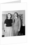 Young newlyweds smile for a portrait, ca. 1956. by Anonymous