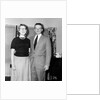 Young newlyweds smile for a portrait, ca. 1956. by Anonymous