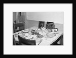 Jesus watches over the dinner table, ca. 1956. by Anonymous