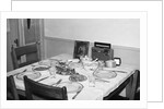 Jesus watches over the dinner table, ca. 1956. by Anonymous