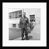 US army soldier poses for a photo on base, ca. 1954. by Anonymous
