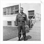 US army soldier poses for a photo on base, ca. 1954. by Anonymous