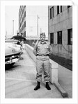 US army soldier poses for a photo on base, ca. 1954. by Anonymous