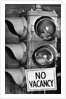 No vacancy sign by traffic lights with birds' nests inside by Anonymous