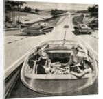 Family Playing Game While Futuristic Car Drives Itself. by Anonymous