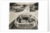 Family Playing Game While Futuristic Car Drives Itself. by Anonymous