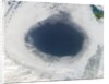 Cloud hole caused by intense high pressure system by Anonymous