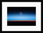 Crescent moon photographed from orbit aboard the International Space Station by Anonymous