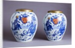 Pair of porcelain Delft blue and white tobacco jars by Anonymous