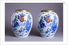 Pair of porcelain Delft blue and white tobacco jars by Anonymous
