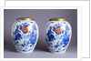 Pair of porcelain Delft blue and white tobacco jars by Anonymous
