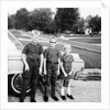 A lineup of kids by the family car. 1965. by Anonymous