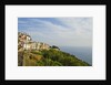 View of town on coastline by Anonymous
