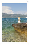 Stack of pebbles on cliff, Lumbarda, Korcula island, Croatia by Anonymous