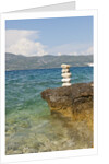 Stack of pebbles on cliff, Lumbarda, Korcula island, Croatia by Anonymous