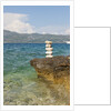 Stack of pebbles on cliff, Lumbarda, Korcula island, Croatia by Anonymous