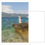 Stack of pebbles on cliff, Lumbarda, Korcula island, Croatia by Anonymous