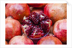 Pomegranates in Carmel Market by Anonymous