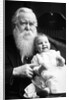 Senior man holds his grandson, ca. 1910 by Anonymous