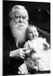 Senior man holds his grandson, ca. 1910 by Anonymous