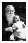 Senior man holds his grandson, ca. 1910 by Anonymous