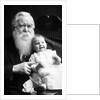 Senior man holds his grandson, ca. 1910 by Anonymous
