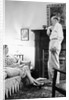 Senior man and woman in the living room, ca. 1935 by Anonymous