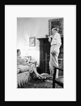Senior man and woman in the living room, ca. 1935 by Anonymous