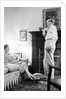Senior man and woman in the living room, ca. 1935 by Anonymous