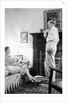 Senior man and woman in the living room, ca. 1935 by Anonymous
