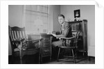 Harvard grad student studies as his desk, ca. 1938 by Anonymous