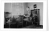 Harvard grad student studies as his desk, ca. 1938 by Anonymous