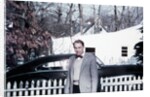 Mature man in front of 1940s car, ca. 1950 by Anonymous