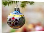 Close-up of a decorated hanging bauble against blurred background by Anonymous