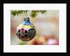 Close-up of a decorated hanging bauble against blurred background by Anonymous